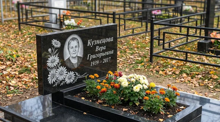 Памятник с гравировкой ромашек — выполненная работа «Кузнецова» в Липецке