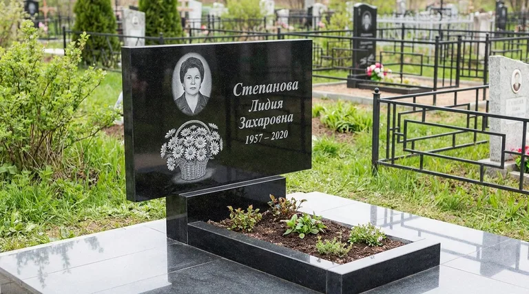 Памятник с гравировкой ромашек — выполненная работа «Степанова» в Липецке