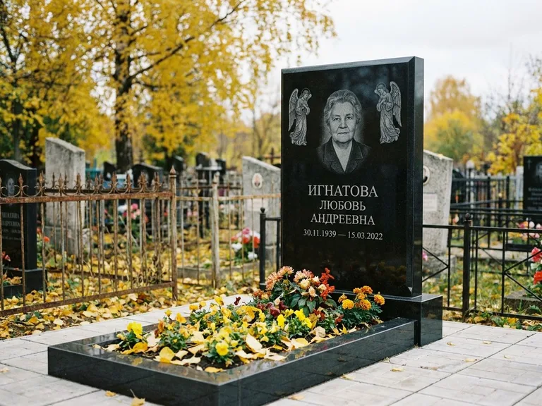 Памятник с гравировкой ангела — гравировка двух ангелов по сторонам портрета, работа «Игнатова» в Липецке