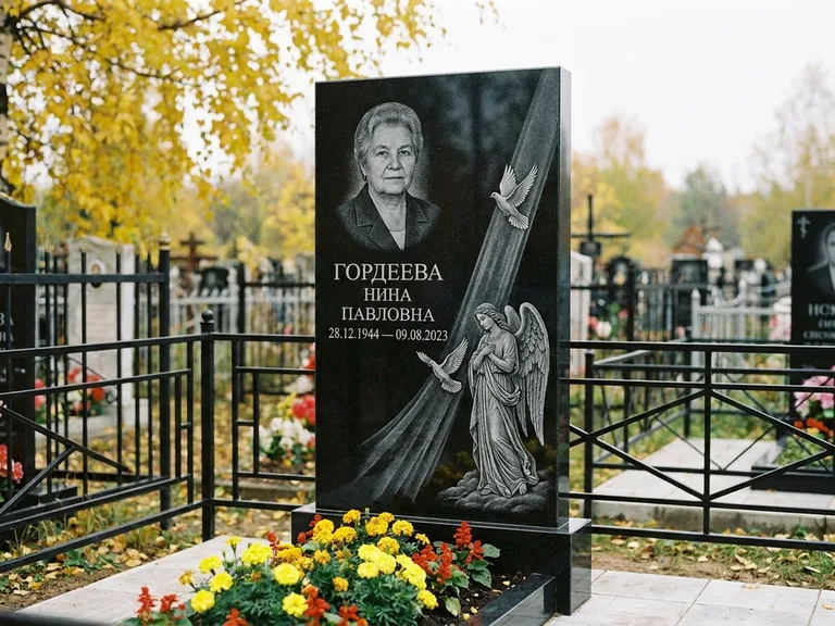 Памятник с гравировкой ангела — гравировка ангела с голубем по диагонали стелы, работа «Гордеева» в Липецке