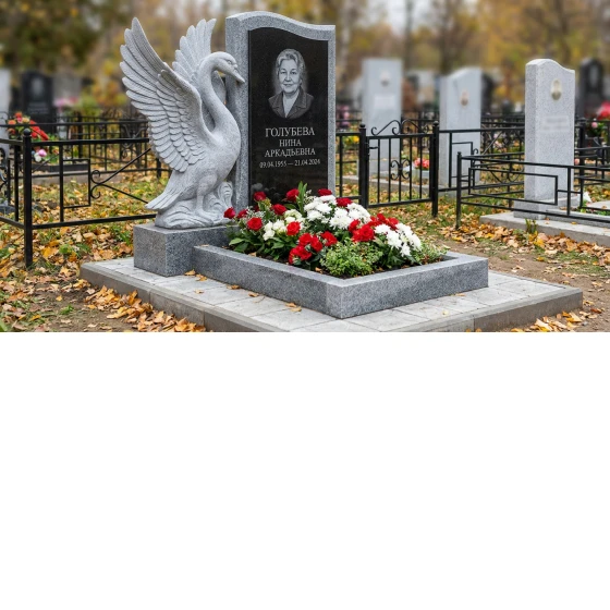 Памятник с лебедем и распростертыми крыльями из мансуровского гранита