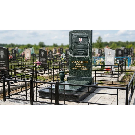Гранитный памятник с барельефом грузовика