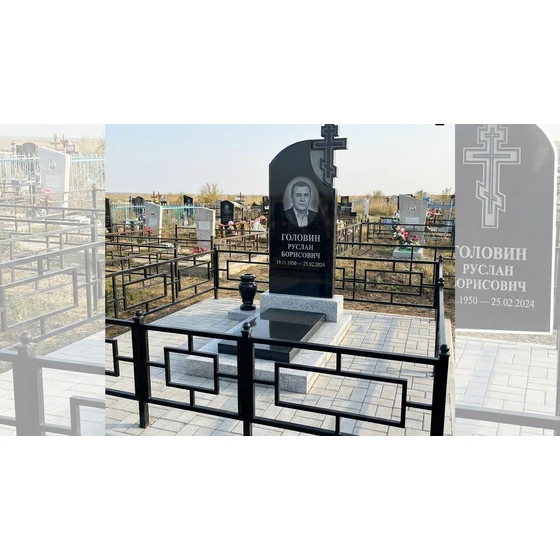 Гранитный памятник с православным крестом и портретом